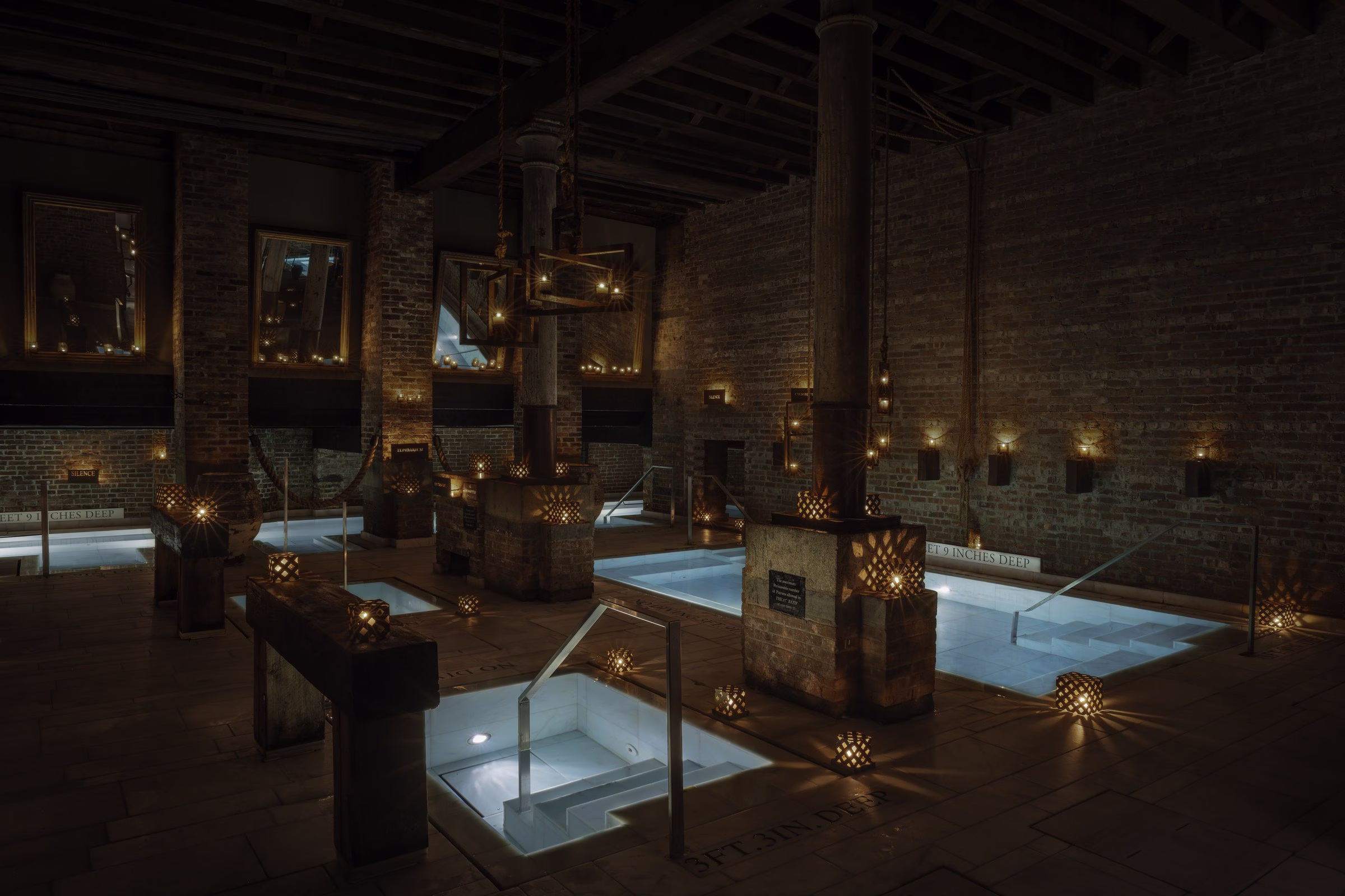 AIRE Ancient Baths candlelit thermal pools inside a restored brick factory at the Tribeca New York sanctuary