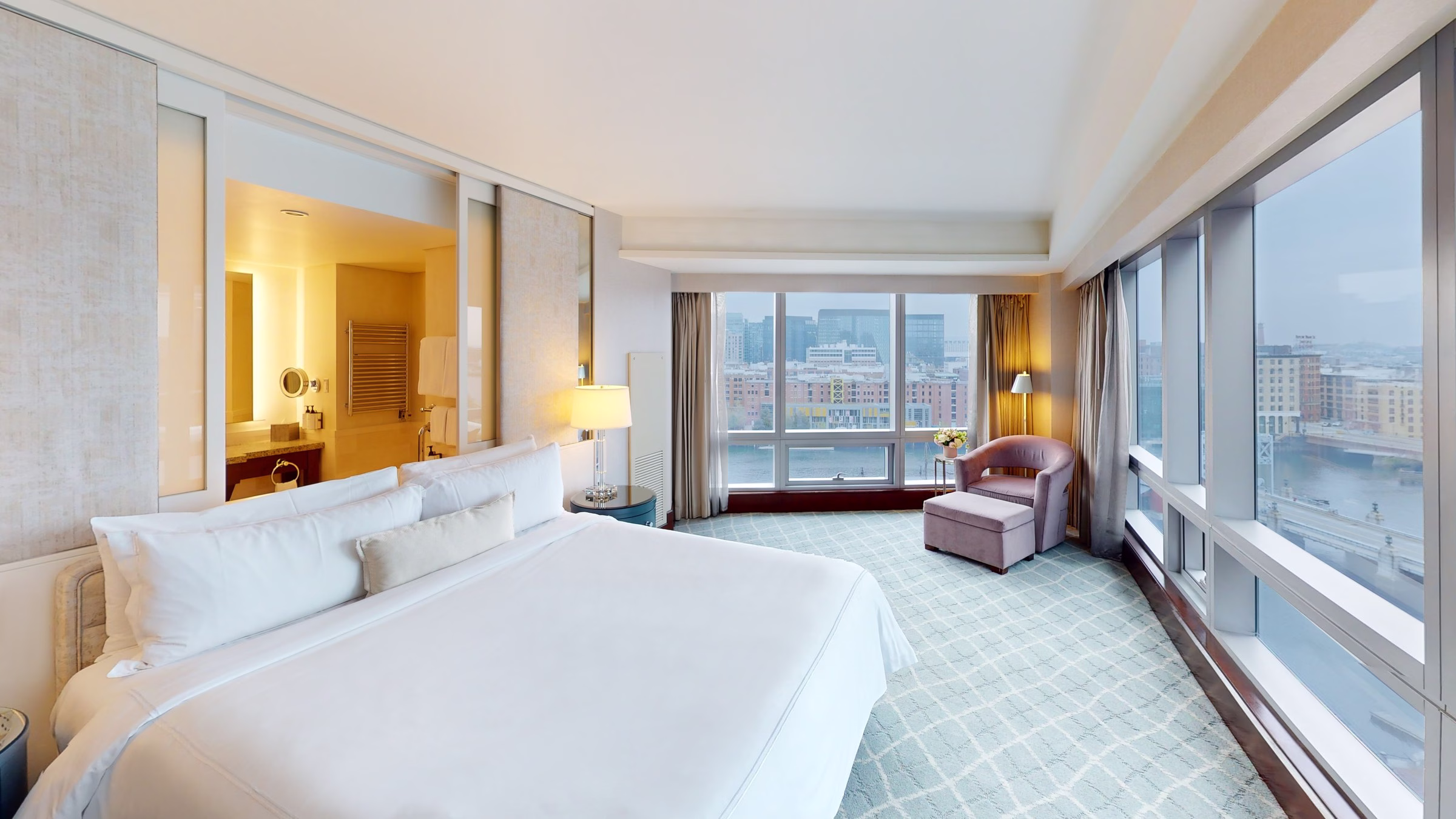 InterContinental Boston guest room with king bed and floor-to-ceiling Boston Harbor view