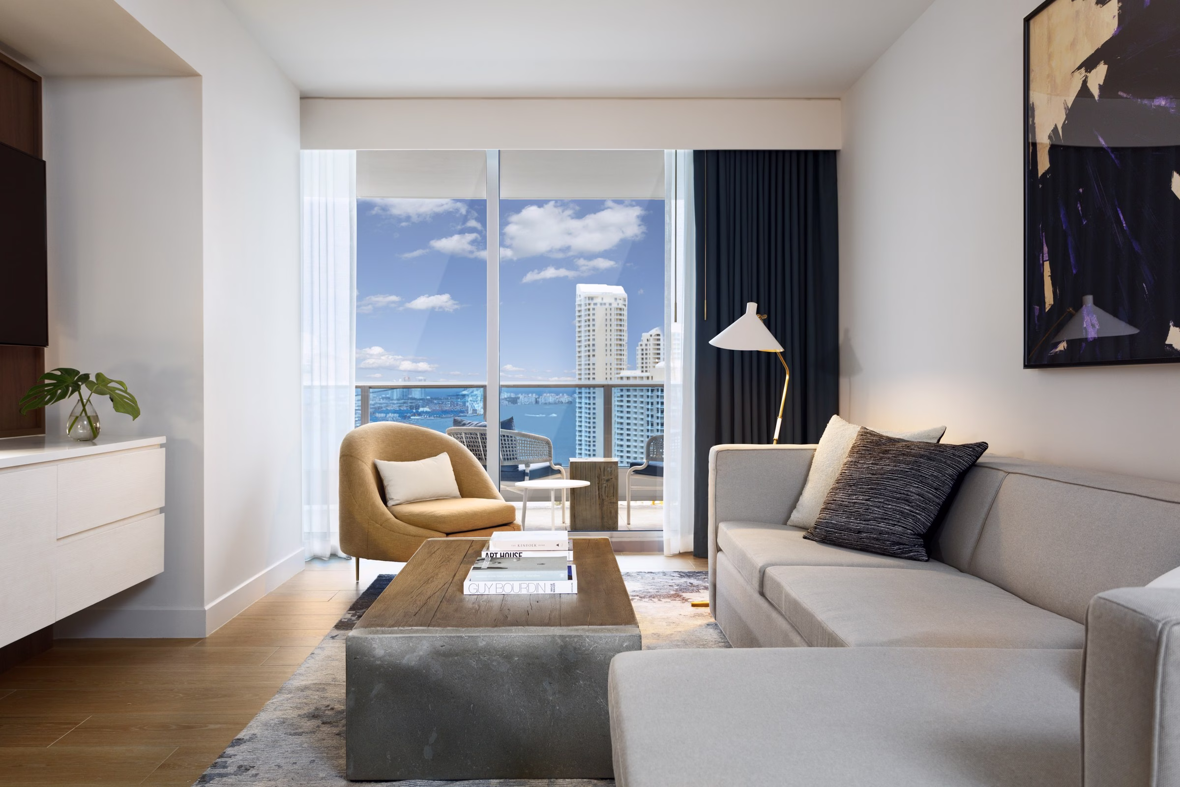 Kimpton EPIC Hotel Miami rooftop pool deck overlooking downtown skyline